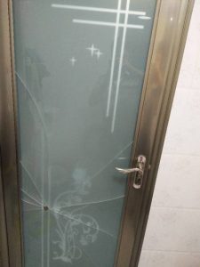 The toilet door is glass if you can see inside