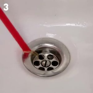 Clever use of straws to help you unclog the drain