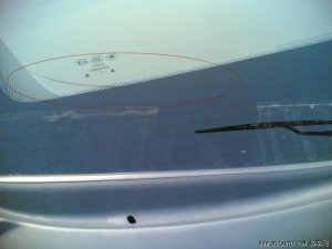 How do you get rid of the outdated stickers on the front windshield?